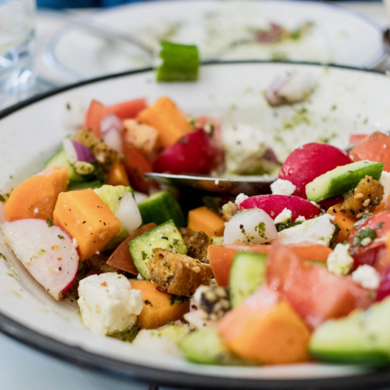 half eaten gourmet salad